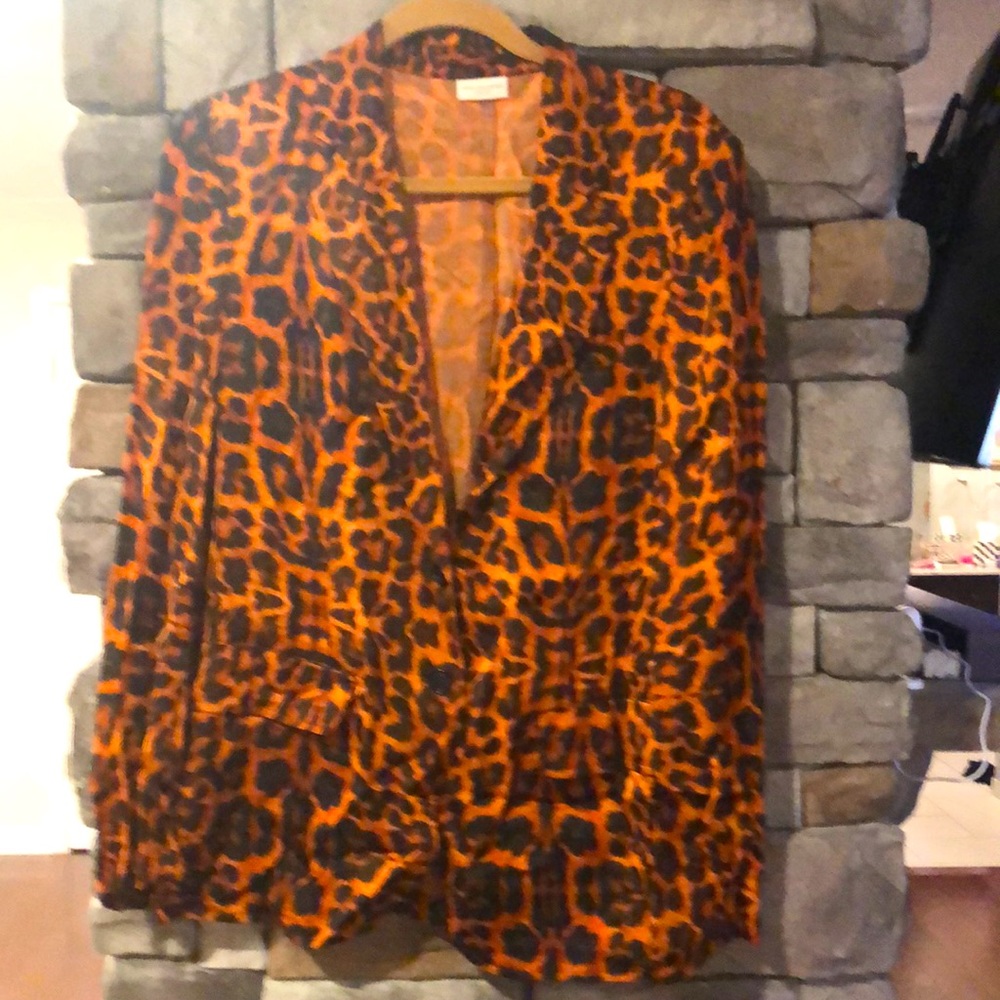 Jacket bright fall colors fits true to size.
